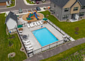 Thumbnail 41 of 48 - Aerial Pool View at Foxtail Hollow Townhomes, Blaine