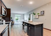 Thumbnail 66 of 82 - kitchen with island at Lake Jonathan Flats, Chaska, MN