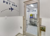 Thumbnail 46 of 53 - a glass door with a sign on the side of it that says first class pet spa