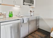 Thumbnail 3 of 53 - Studio Kitchen at Aire MSP Apartments, Bloomington, MN, 55425
