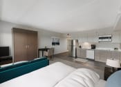 Thumbnail 24 of 53 - Kitchen And Living Area at Aire MSP Apartments, Bloomington, Minnesota