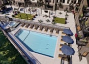 Thumbnail 1 of 65 - a view of the pool from above at the grove resort and spa at Ardor on the Bluffs South Loop Residences Apartments, Bloomington, MN