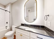 Thumbnail 53 of 65 - a bathroom with a sink toilet and a shower at Ardor on the Bluffs South Loop Residences Apartments, Bloomington, MN, 55425
