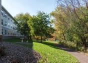 Thumbnail 31 of 34 - Exterior Green Space at Briarcliff Apartments, a 55+ Community, Mahtomedi, 55115
