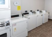 Thumbnail 27 of 34 - Laundry Room at Briarcliff Apartments, a 55+ Community, Mahtomedi, MN