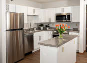 Thumbnail 2 of 34 - a kitchen with white cabinets and stainless steel appliances  at Briarcliff Apartments, a 55+ Community, Mahtomedi, 55115