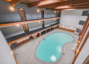 Thumbnail 53 of 56 - a view of the indoor pool and hot tub from the second floor of the building