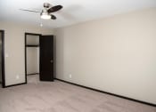 Thumbnail 25 of 28 - One bedroom with ceiling fan and large closet