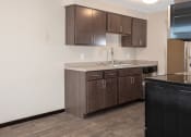 Thumbnail 21 of 28 - upgraded kitchen with slate cabinets and stainless steel appliances