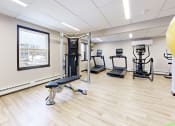 Thumbnail 16 of 28 - fitness center with cardio and lifting equipment