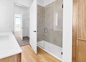 Thumbnail 36 of 61 - A white sink in a modern bathroom.