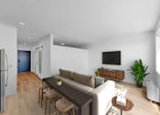 Thumbnail 44 of 61 - A modern living room with a couch, a coffee table, and a television.