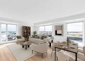 Thumbnail 28 of 61 - A modern living room with a view of the city.