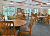 Thumbnail 4 of 29 - community room with lots of seating
