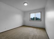 Thumbnail 19 of 56 - an empty room with a window
