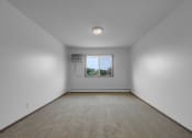 Thumbnail 35 of 56 - an empty room with a window