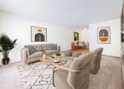 Thumbnail 10 of 56 - a living room with two couches and two chairs