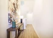 Thumbnail 16 of 48 - a long hallway at Foxtail Hollow Townhomes, Blaine, MN