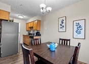 Thumbnail 4 of 15 - Kitchen and Dining Area at Granite Peaks Apartments, Minneapolis, MN