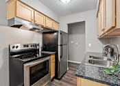Thumbnail 8 of 21 - Gourmet Kitchen at Granite Ridge Apartments, Minnesota, 55428
