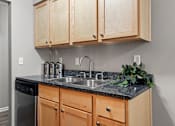 Thumbnail 11 of 21 - Functional Kitchen at Granite Ridge Apartments, Brooklyn Park