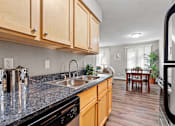 Thumbnail 10 of 21 - Modern Kitchen at Granite Ridge Apartments, Brooklyn Park, 55428