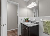 Thumbnail 18 of 21 - Guest Bathroom at Granite Ridge Apartments, Minnesota