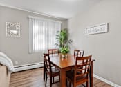 Thumbnail 5 of 21 - Elegant Dining Area at Granite Ridge Apartments, Brooklyn Park, MN