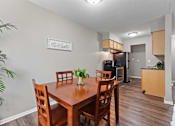 Thumbnail 6 of 21 - Modern Dining Room at Granite Ridge Apartments, Brooklyn Park