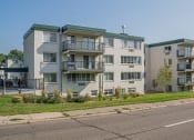 Thumbnail 37 of 38 - an image of an apartment building on the side of a street