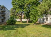 Thumbnail 34 of 38 - the preserve at city center apartments courtyard and trees