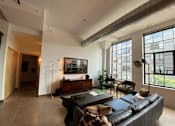 Thumbnail 12 of 44 - Clubroom With TV at Gurley Lofts, Minnesota, 55401