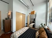 Thumbnail 14 of 44 - Bedroom With Closet at Gurley Lofts, Minneapolis, 55401