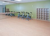 Thumbnail 55 of 73 - A room with exercise bikes and a shelving unit.at Third North Apartments, Minnesota, 55401