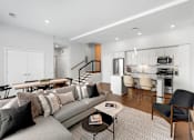 Thumbnail 3 of 77 - Living Room With Kitchen at Viridium Apartments, Minneapolis 