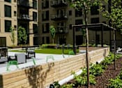 Thumbnail 40 of 77 - Outdoor Lounge at Viridium Apartments, Minnesota, 55401
