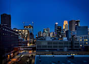 Thumbnail 60 of 77 - A cityscape at dusk at Viridium Apartments, Minneapolis, MN 55401 