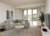 Thumbnail 1 of 30 - Living Room with Large Window at Joseph's Pointe at Upper Landing Apartments, Minnesota, 55102