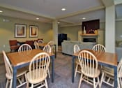 Thumbnail 11 of 30 - Dining Room with a Wooden Table at Joseph's Pointe at Upper Landing Apartments, St. Paul, Minnesota
