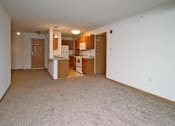 Thumbnail 12 of 30 - Kitchen with White Appliances at Joseph's Pointe at Upper Landing Apartments, St. Paul, MN