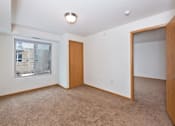 Thumbnail 14 of 30 - A Room with a Carpeted Floor at Joseph's Pointe at Upper Landing Apartments, Minnesota, 55102