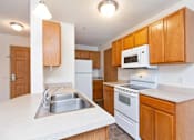 Thumbnail 16 of 30 - Fully Equipped Kitchen at Joseph's Pointe at Upper Landing Apartments, Minnesota, 55102