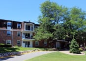 Thumbnail 1 of 28 - Front Exterior of Chateau Carmel in West St. Paul