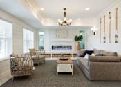 Thumbnail 5 of 80 - Living area with fireplace at The Barnum Apartments, White Bear Lake, MN,  55110