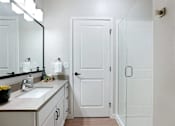 Thumbnail 64 of 80 - Bathroom With Storage at The Barnum Apartments, White Bear Lake, Minnesota
