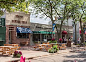Thumbnail 78 of 80 - A barbeque restaurant named Henry's Barbeque Shop is located in a shopping plaza at The Barnum Apartments, Minnesota, 55110