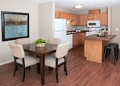 Thumbnail 2 of 26 - Kitchen and dining area