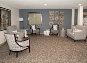 Thumbnail 3 of 31 - community room lounge seating