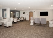 Thumbnail 5 of 31 - Recently updated community room  with tv, seating for games and puzzles
