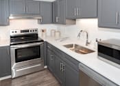 Thumbnail 32 of 83 - Kitchen Appliances at Audenn Apartments, Minnesota